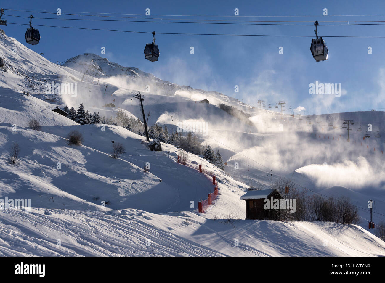 Rendendo la neve artificiale a Les Menuires Foto Stock