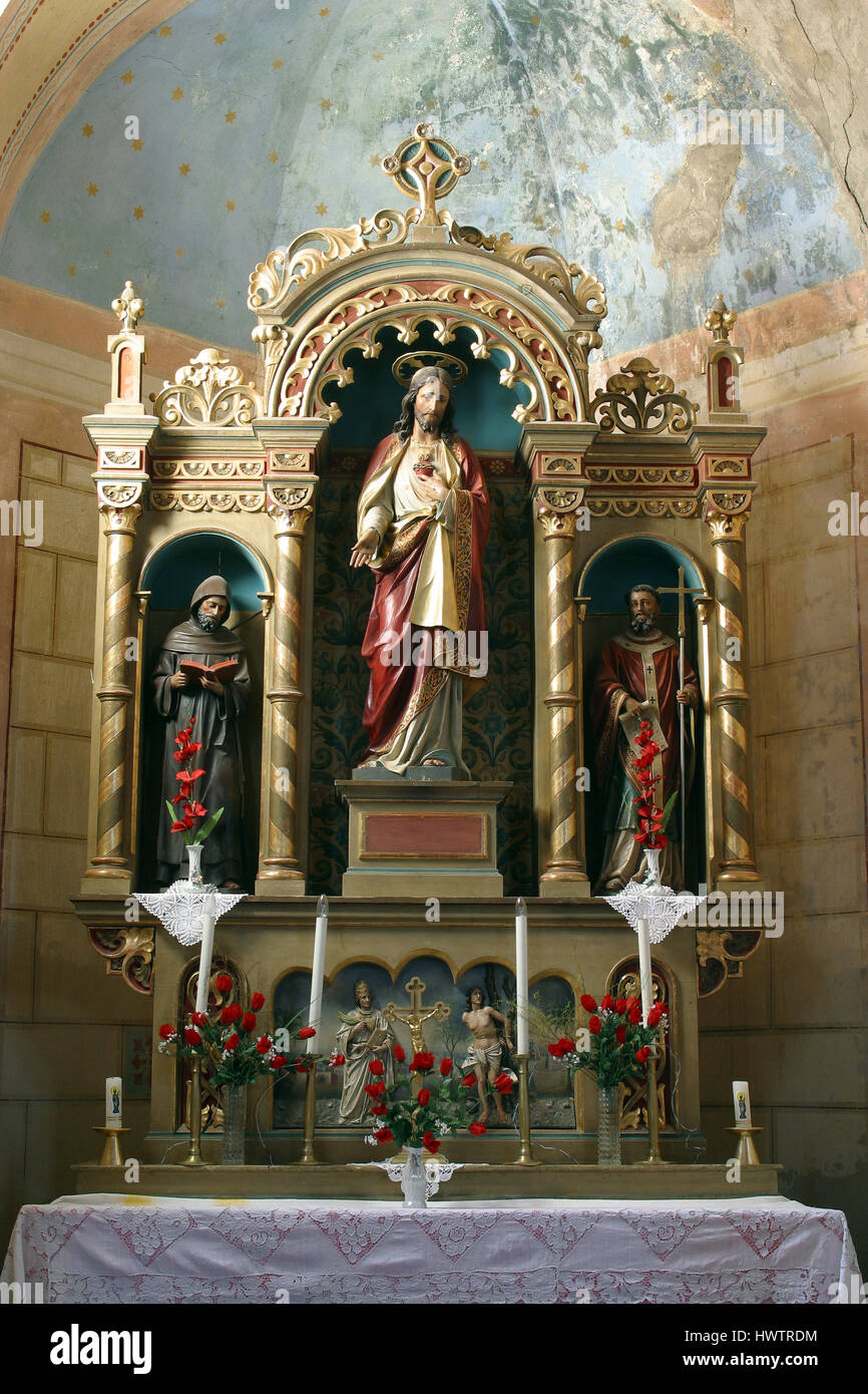 Sacro Cuore di Gesù altare nella chiesa parrocchiale di San Rocco in Kratecko, in Croazia il 16 luglio 2010. Foto Stock