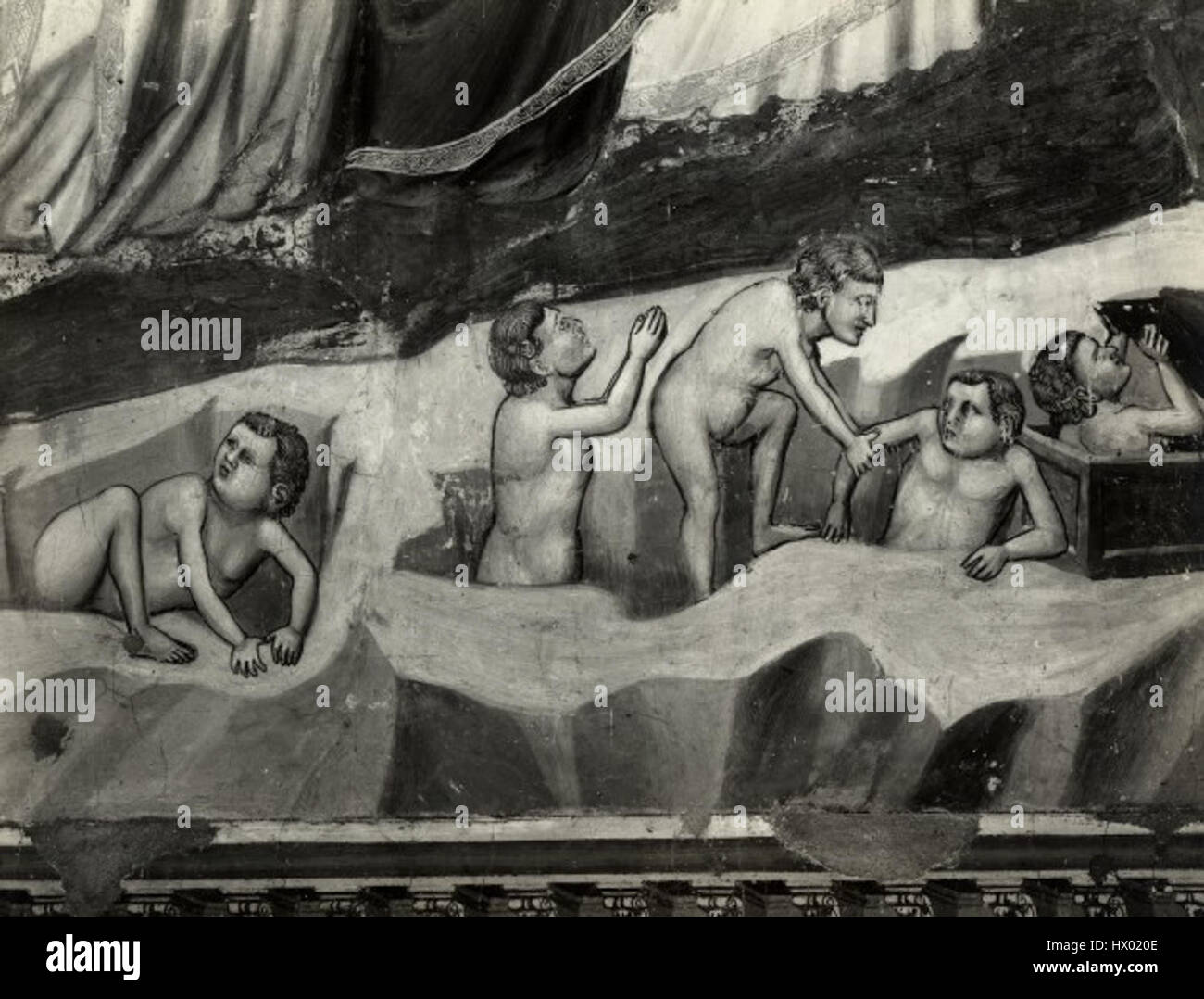 "Giotto, paradiso 15 risveglio dalle tombe" si riferisce a un affresco specifico di Giotto, noto come "la Resurrezione dei morti" o "il risveglio dalle Tombe". L'affresco raffigura la scena biblica della risurrezione, mostrando la maestria di Giotto nell'utilizzare lo spazio e l'emozione per trasmettere il potere divino e la vulnerabilità umana. Foto Stock