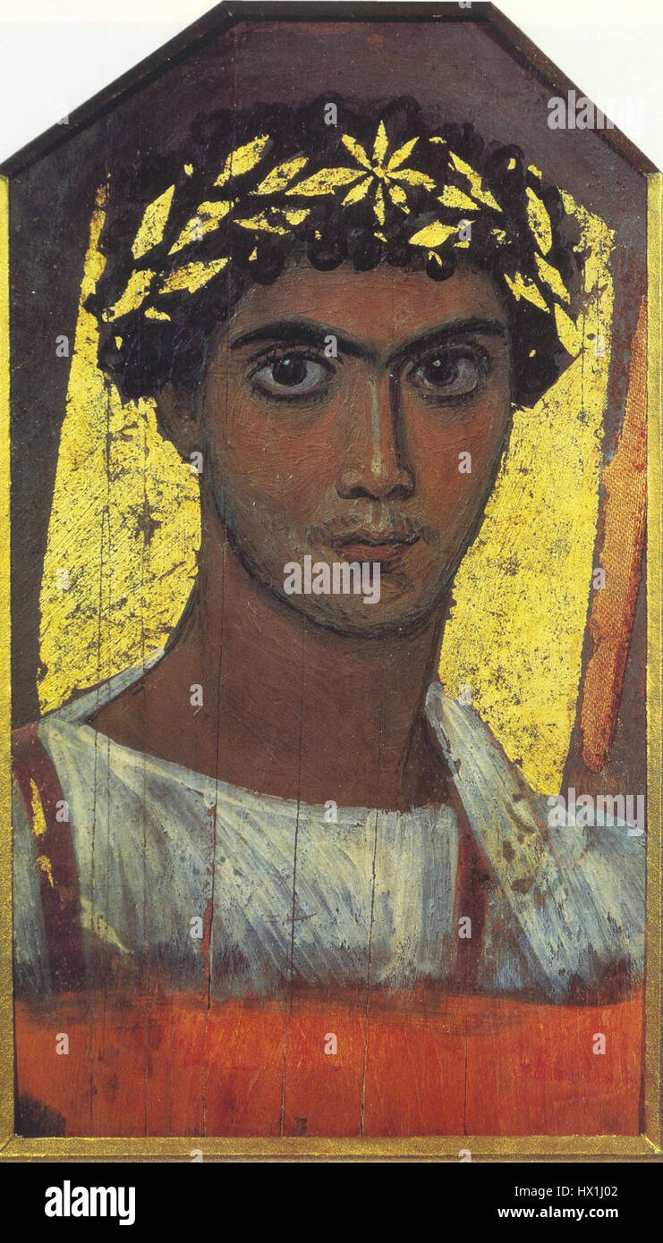 La Corona d'oro Fayum Man è un notevole esempio di ritrattistica egiziana antica. Risalente al i secolo d.C., questo ritratto dipinto su legno mostra un uomo che indossa una corona d'oro, simboleggiando la ricchezza e lo status. Il pezzo fa parte dei ritratti di mummia Fayum, che sono stati utilizzati per decorare le mummie del defunto, offrendo uno sguardo sulle pratiche di arte funeraria dell'antico Egitto. Foto Stock