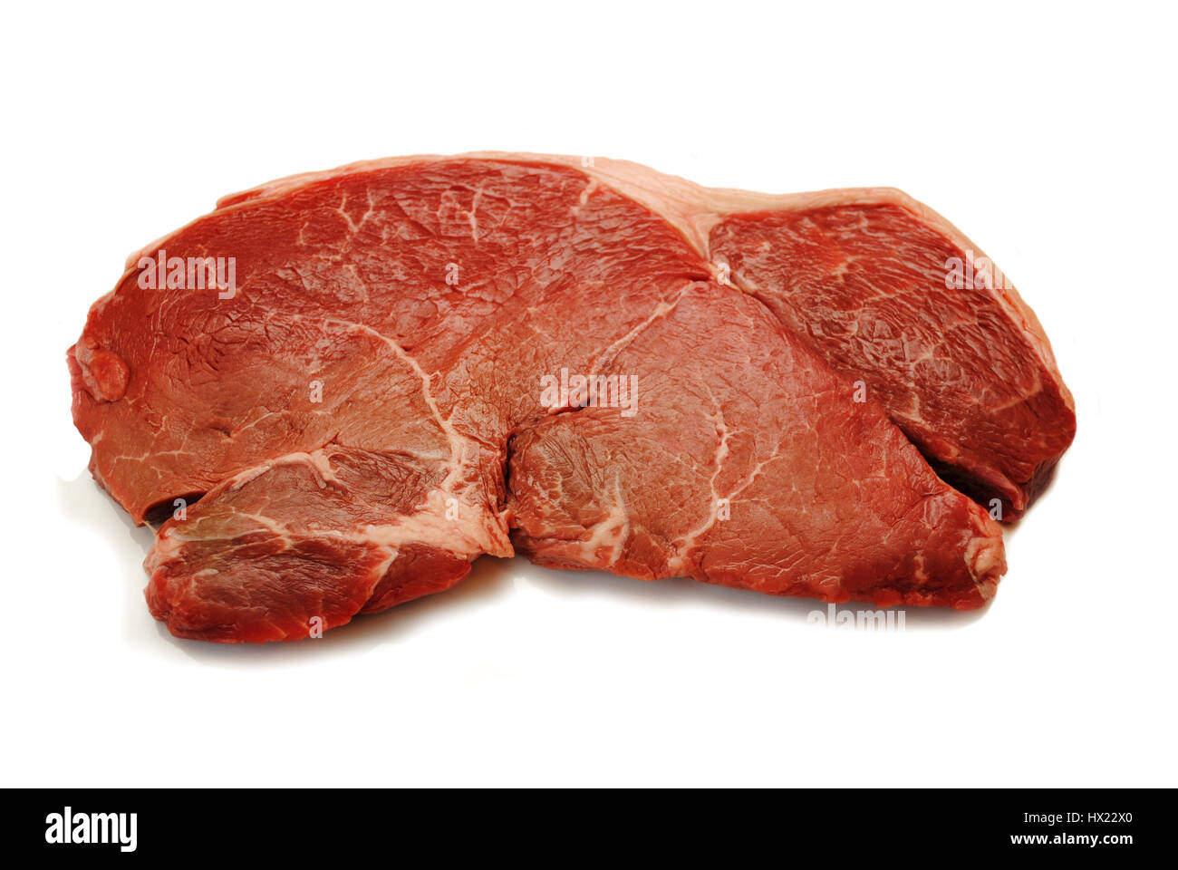 Organici bistecca di manzo isolato su bianco Foto Stock