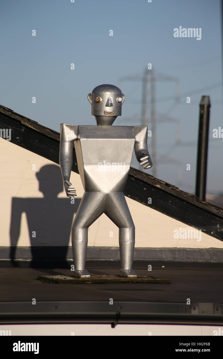 Statua di Robot sul tetto Foto Stock