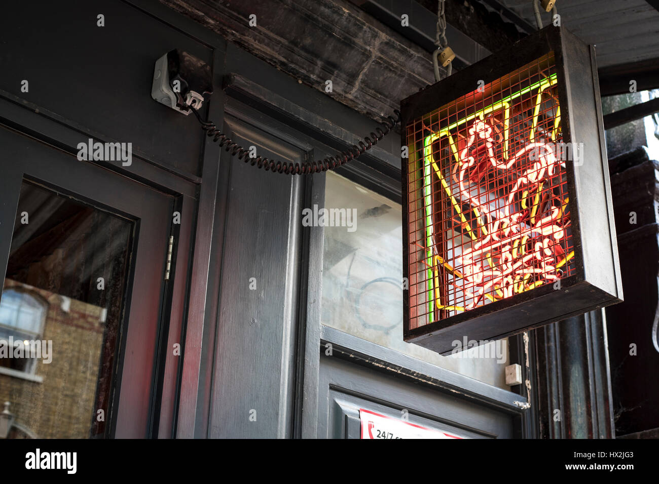 La Rooster insegna al neon in Chinatown, Londra Foto Stock