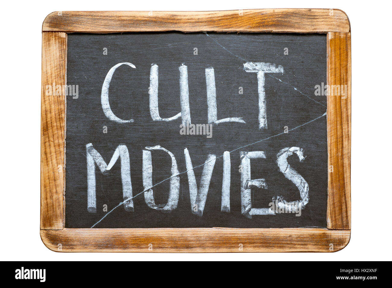 Cult movies manoscritta su vintage scuola scheda di ardesia isolato su bianco Foto Stock