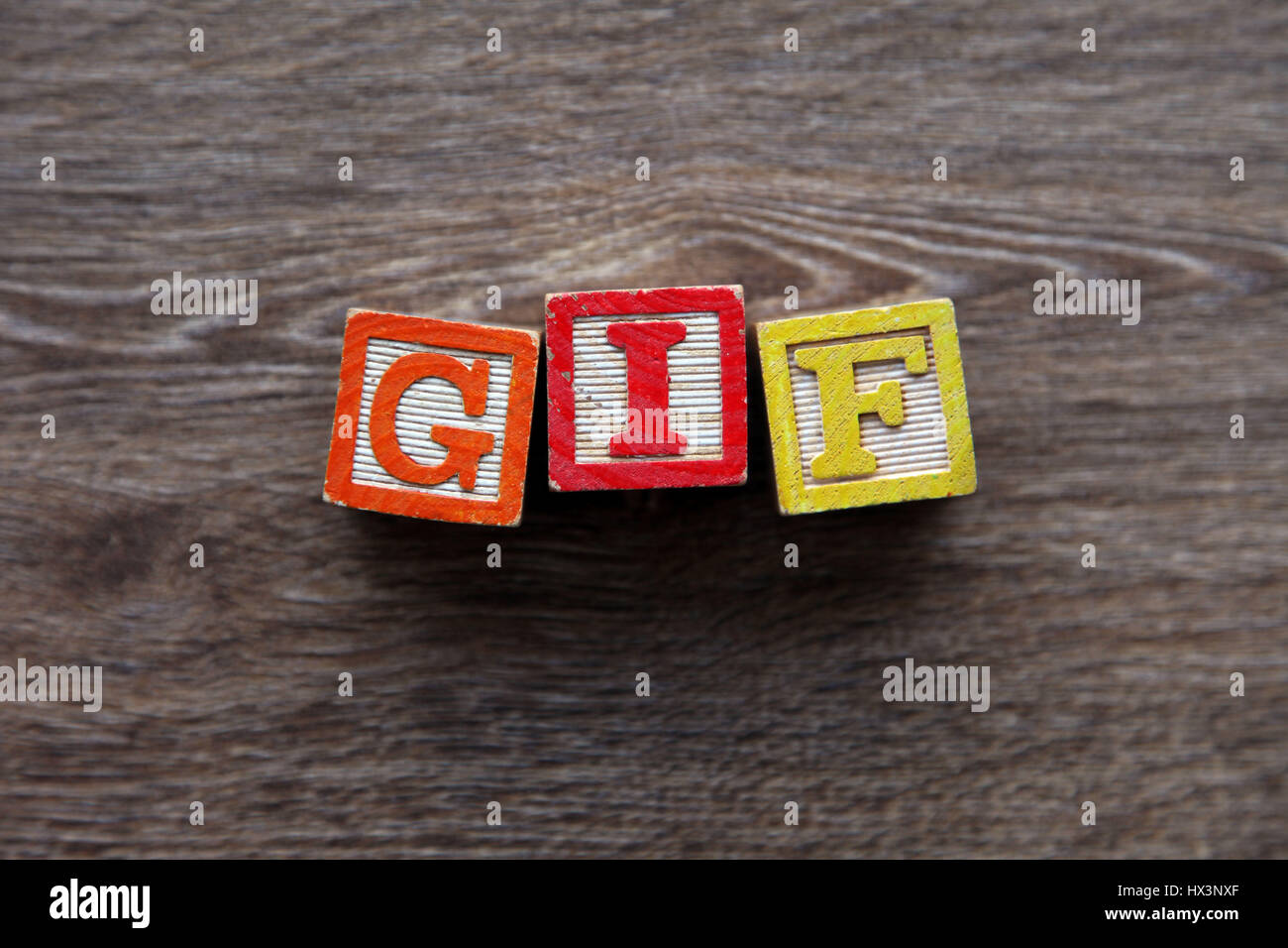 Il formato GIF scritto con un blocco di legno alfabeto lettera Foto Stock