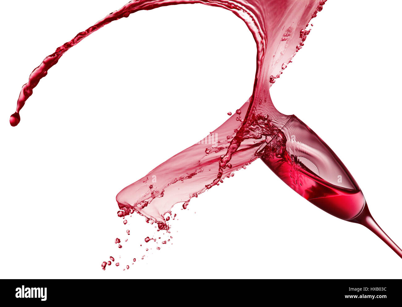 Vino rosso schizzi dal vetro. Foto Stock