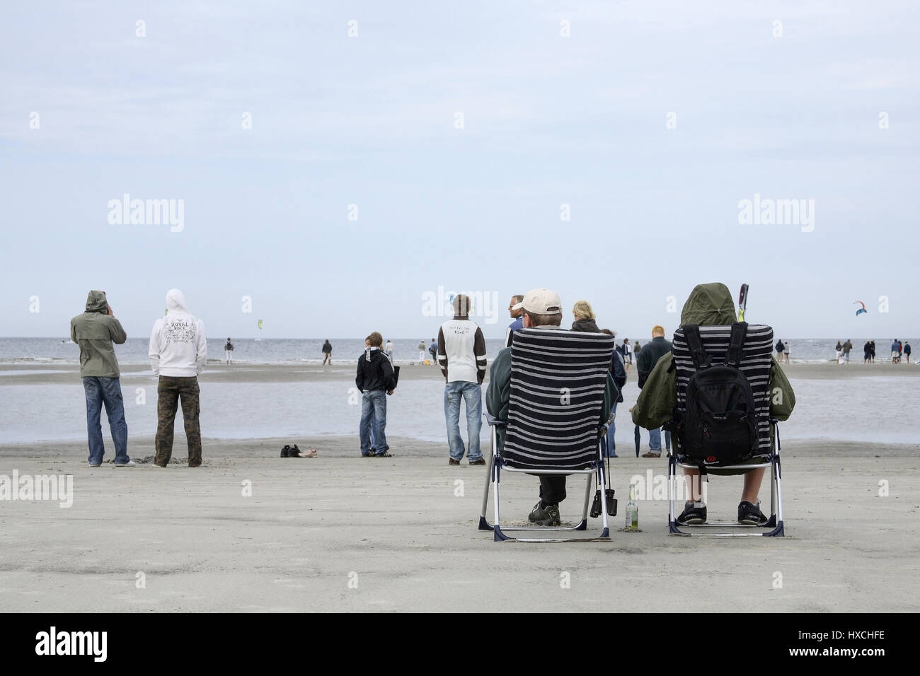 Spettatore sulla spiaggia, Zuschauer am Strand Foto Stock