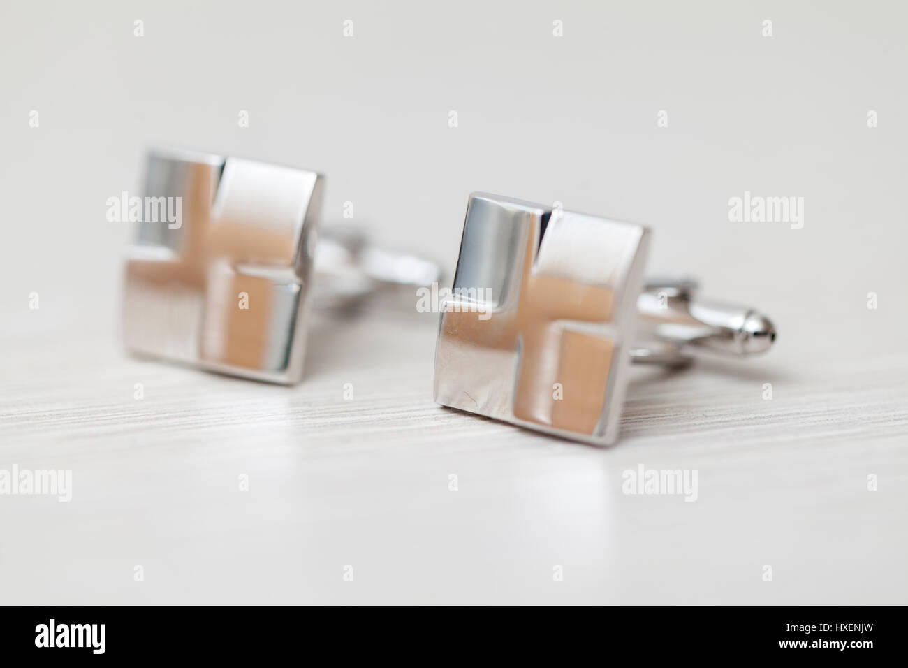 Argento gemelli su sfondo bianco, close up Foto Stock