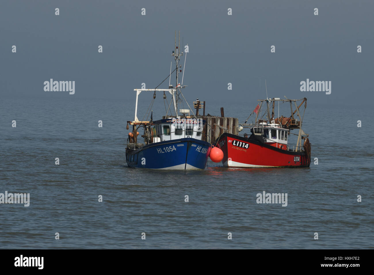 Barche da pesca nel porto di Whistable Kent England Foto Stock