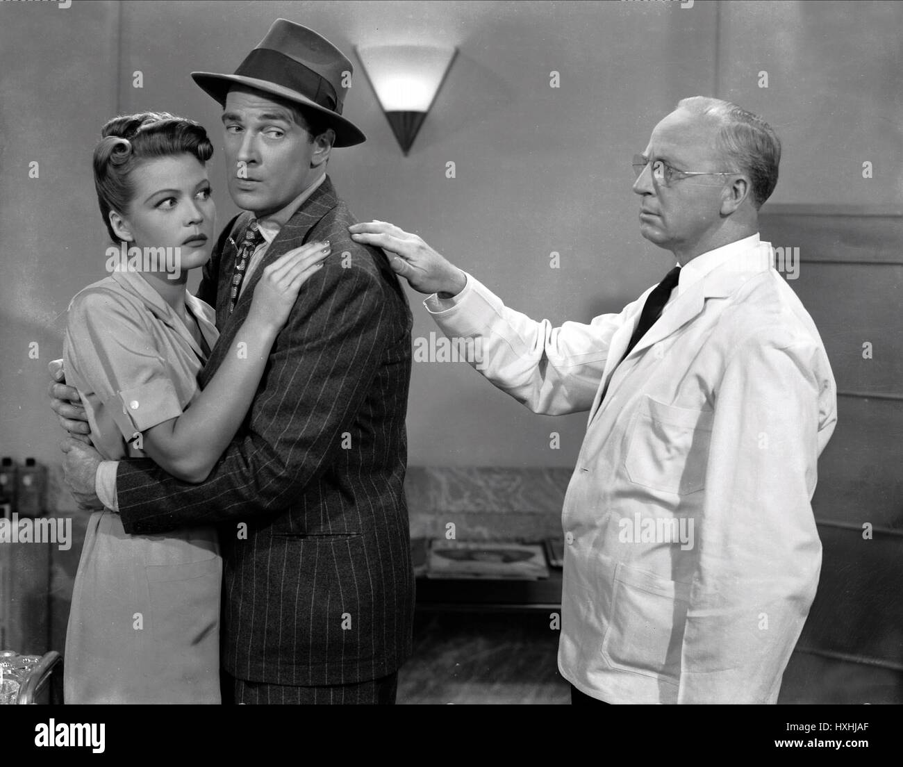 MARY BETH HUGHES, WALTER PIDGEON, DESIGN PER LO SCANDALO, 1941 Foto Stock