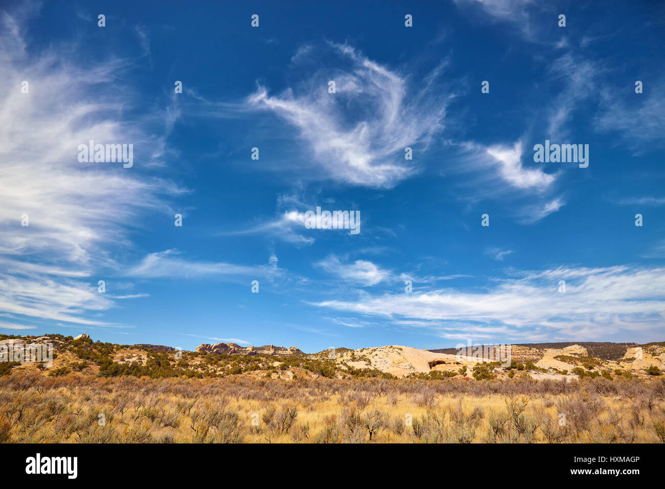 Bella cloudscape sopra una terra sterile, Utah, Stati Uniti d'America. Foto Stock