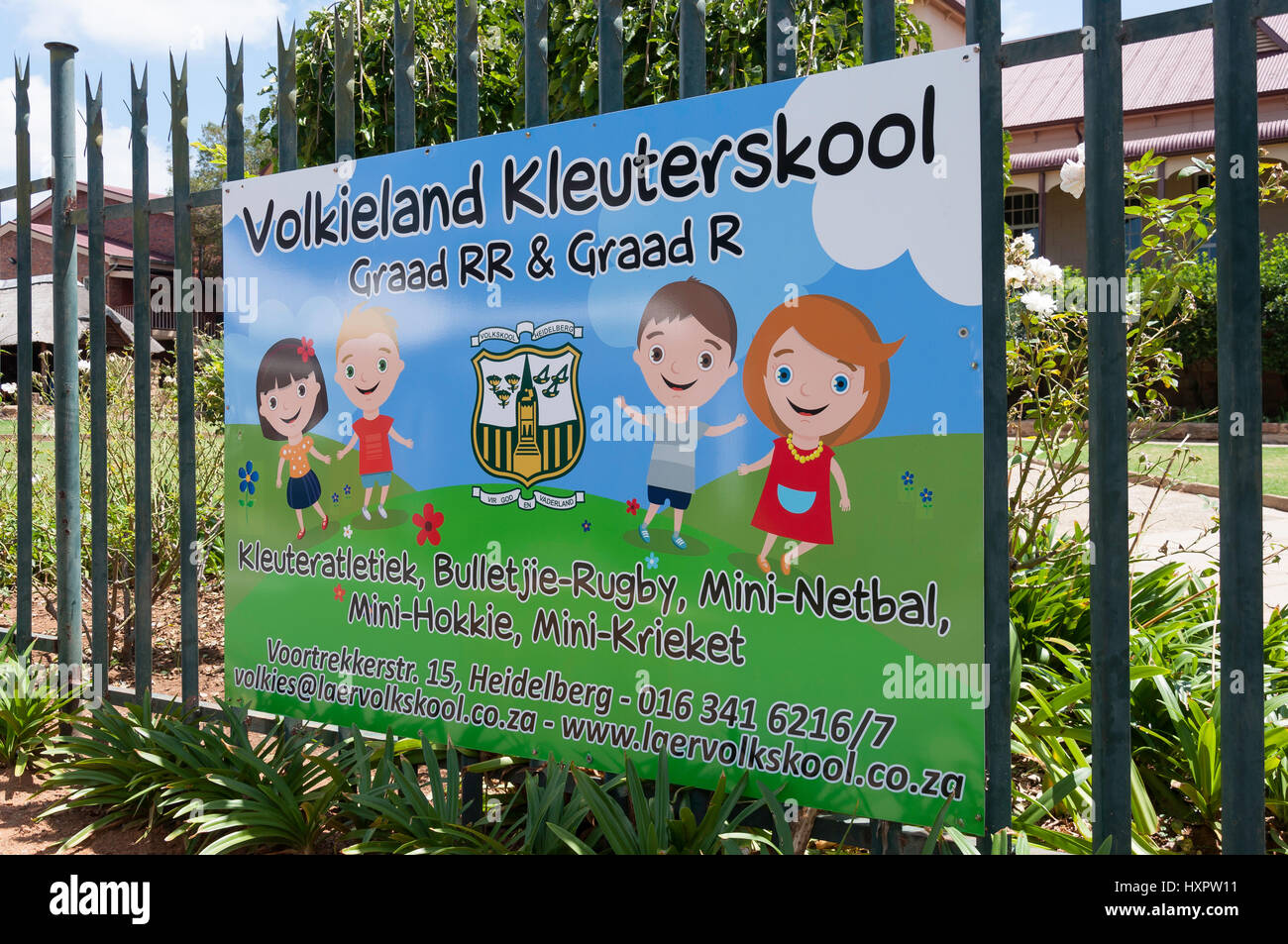 Segno per Afrikaans scuola primaria (Volks-School) edificio, Begeman Street, Heidelberg, provincia di Gauteng, Repubblica del Sud Africa Foto Stock