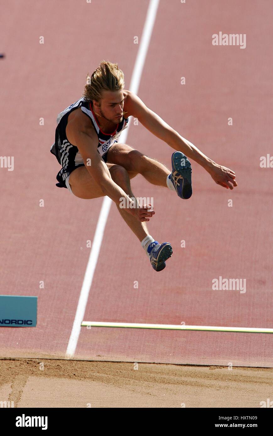 CHRISTOPHER TOMLINSON nel salto in lungo lo stadio olimpico di Helsinki Finlandia 12 agosto 2005 Foto Stock