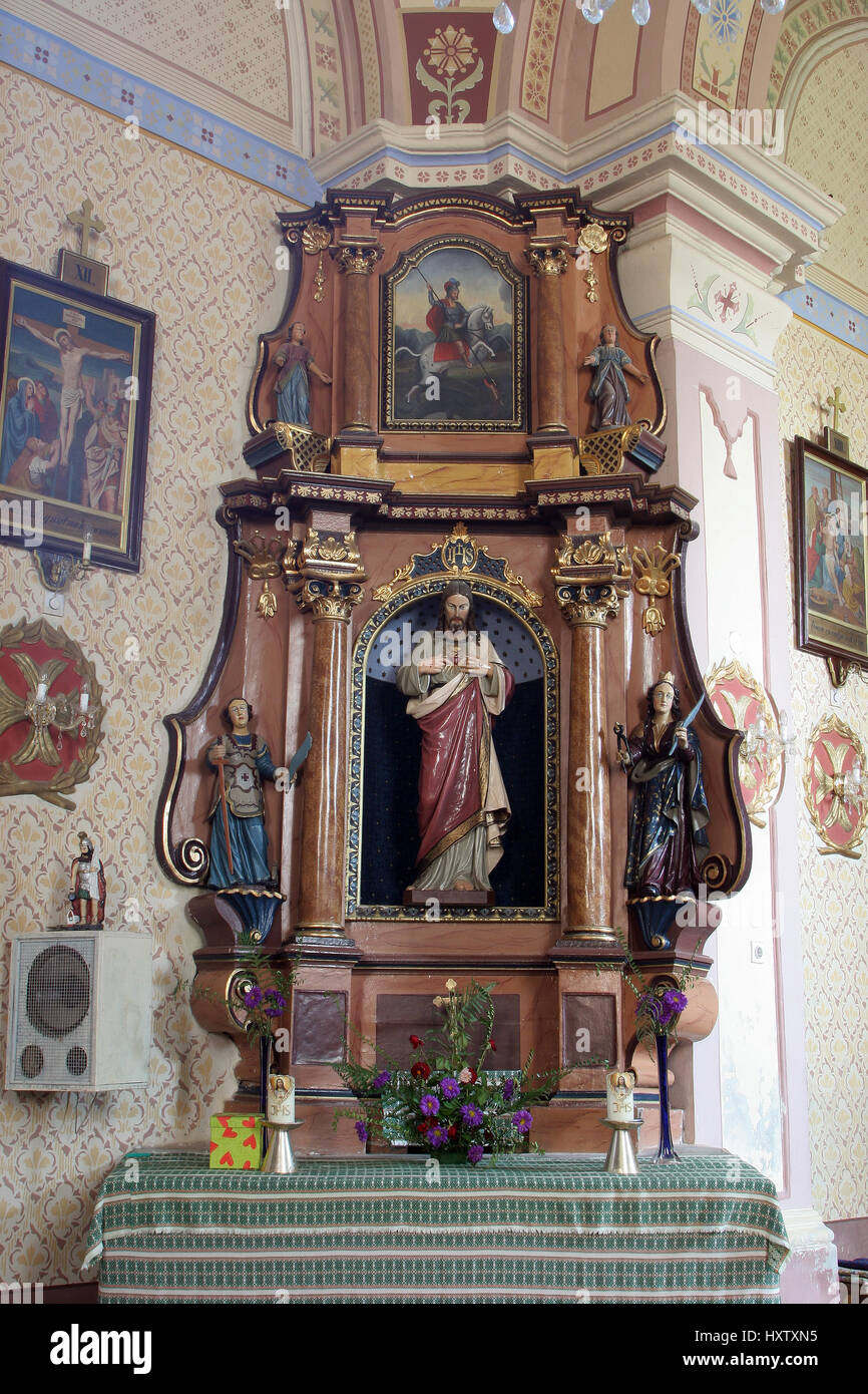 Sacro Cuore di Gesù altare nella chiesa parrocchiale di Saint Martin in Martinska Ves, Croazia Foto Stock