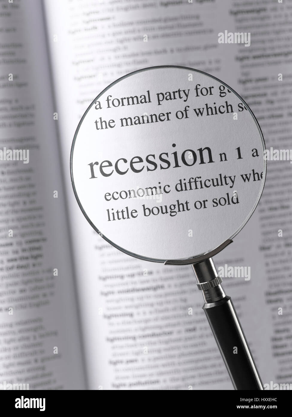 Lente di ingrandimento evidenziando la recessione Foto Stock