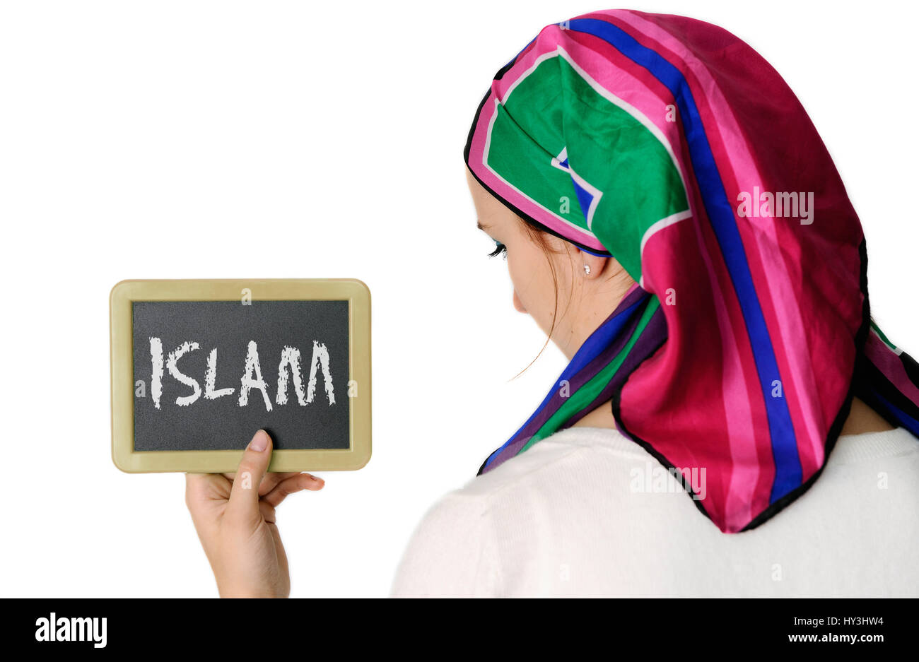 Donna con velo mantiene la scheda con etichetta Islam in mano, velo sentenza, Frau mit Kopftuch hält Tafel mit Aufschrift Islam in der mano, Kopf Foto Stock