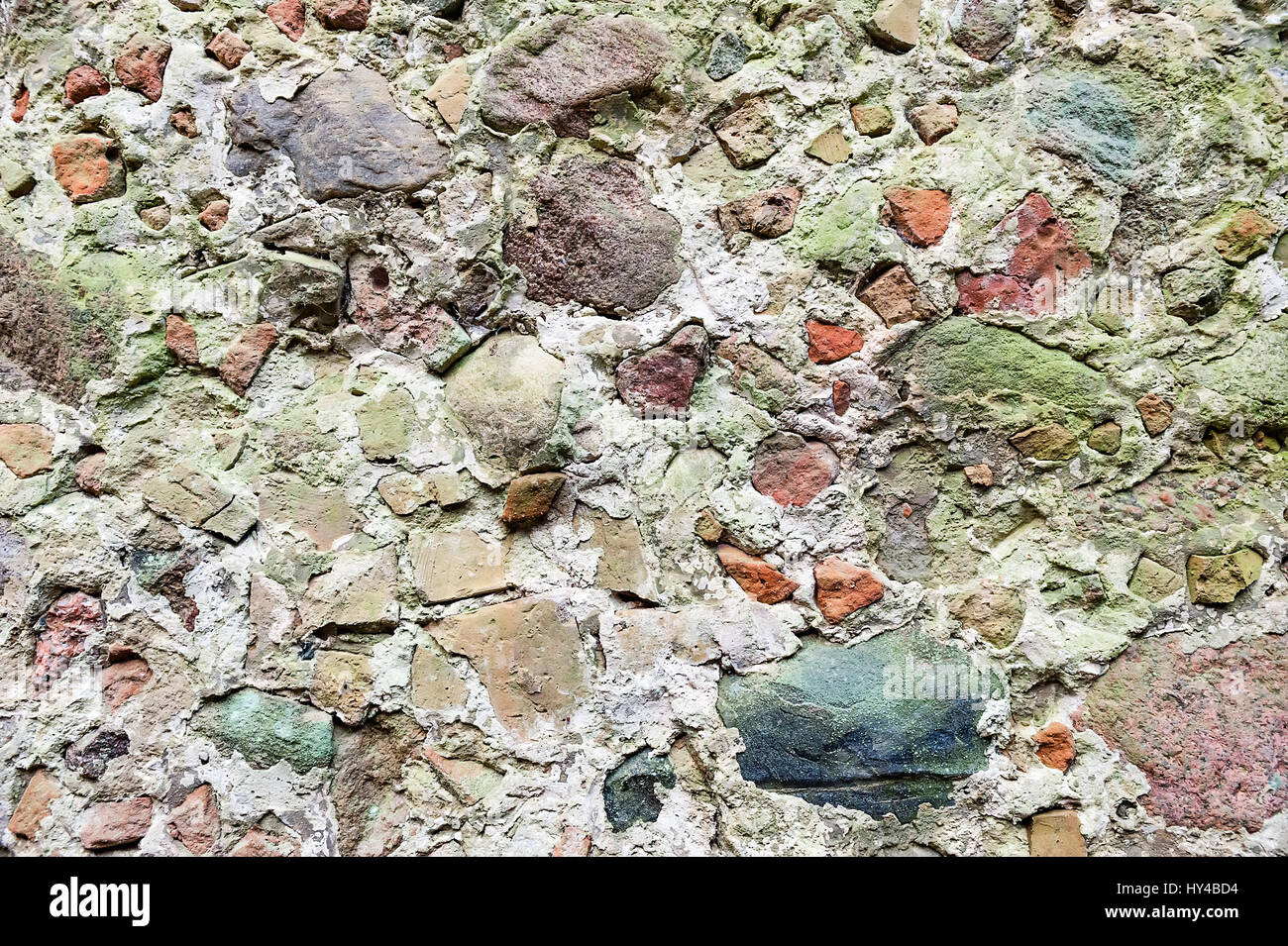 Muro di pietra con il modello reale di colore grigio di stile moderno design decorativo incrinata irregolare di cemento di superficie Foto Stock