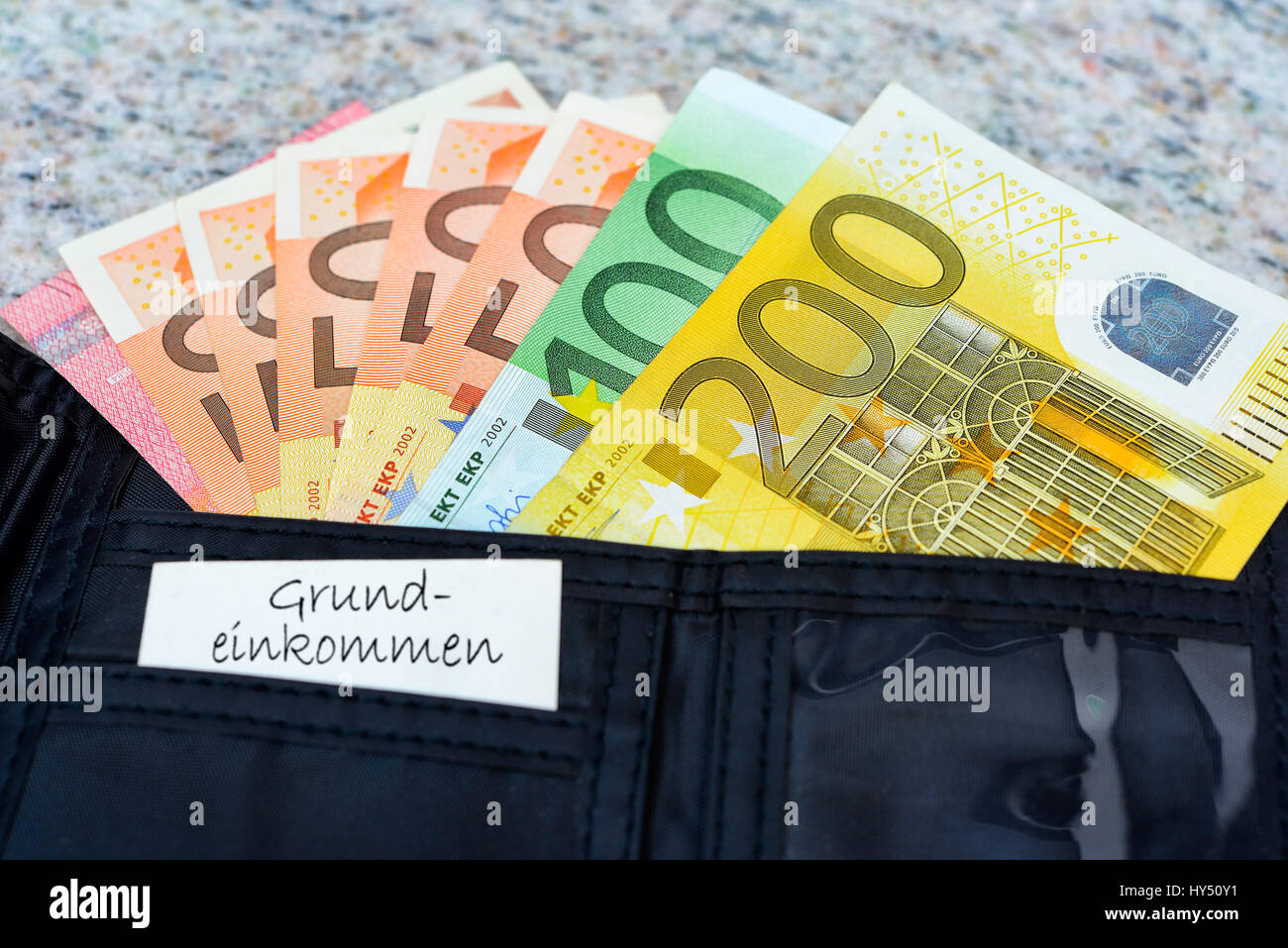 Portamonete con 560 euro di reddito di base, Geldboerse mit 560 Euro Grundeinkommen Foto Stock