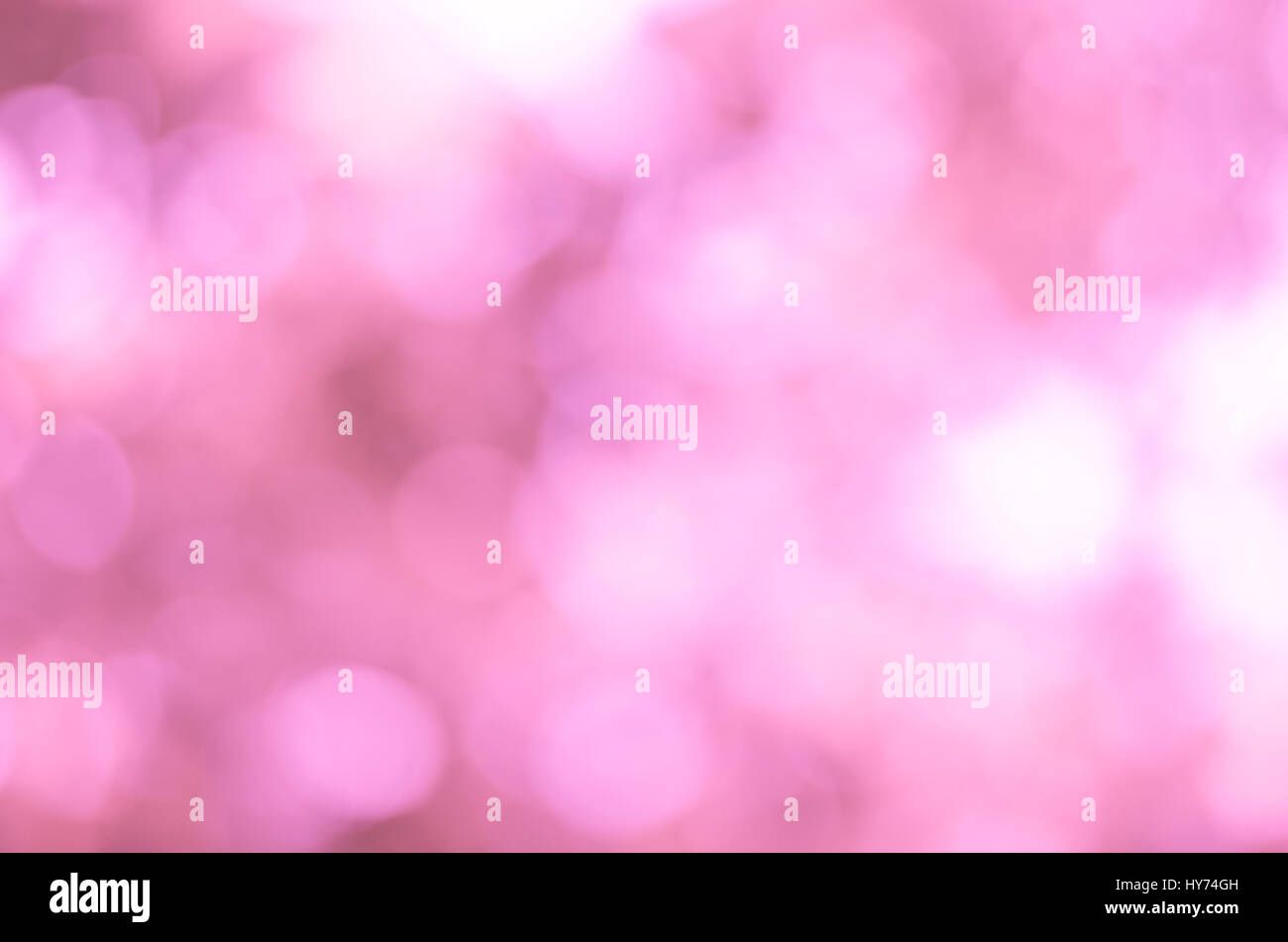 Abstract di sfocatura dello sfondo bokeh in tonalità rosa Foto Stock