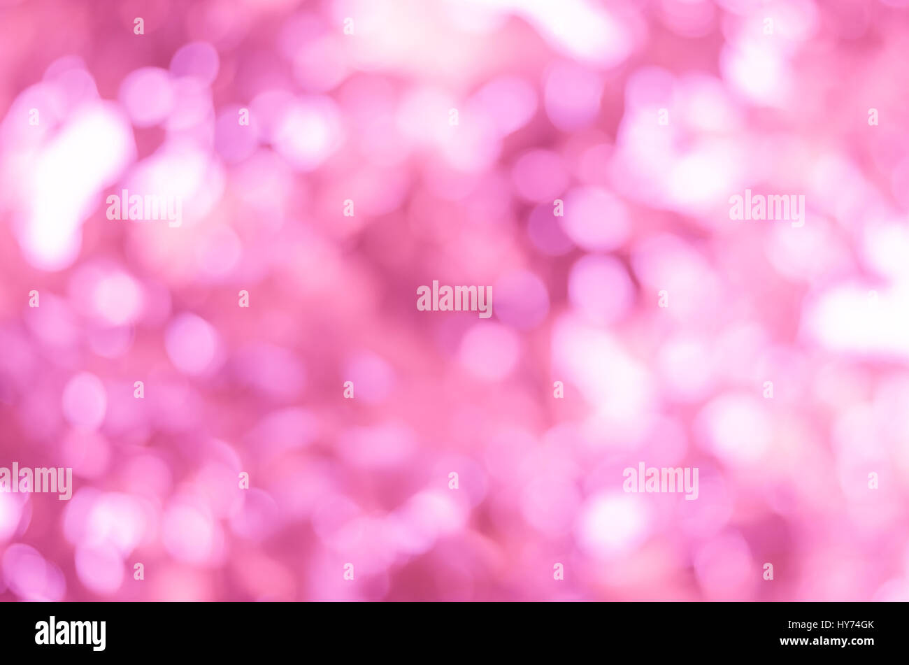 Abstract di sfocatura dello sfondo bokeh in tonalità rosa Foto Stock