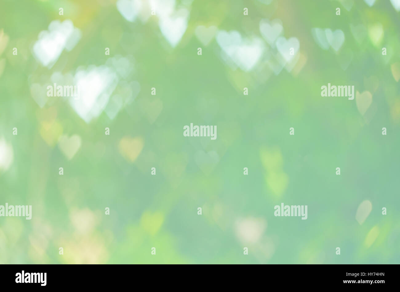 Abstract cuore di sfondo bokeh di fondo di forma in tono verde Foto Stock