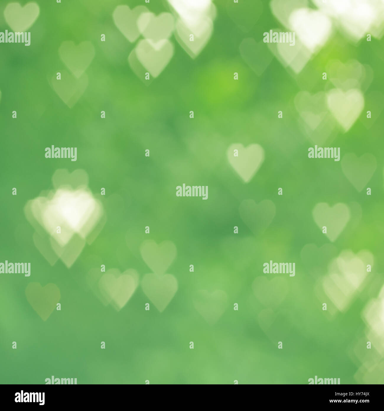 Abstract cuore di sfondo bokeh di fondo di forma in tono verde Foto Stock