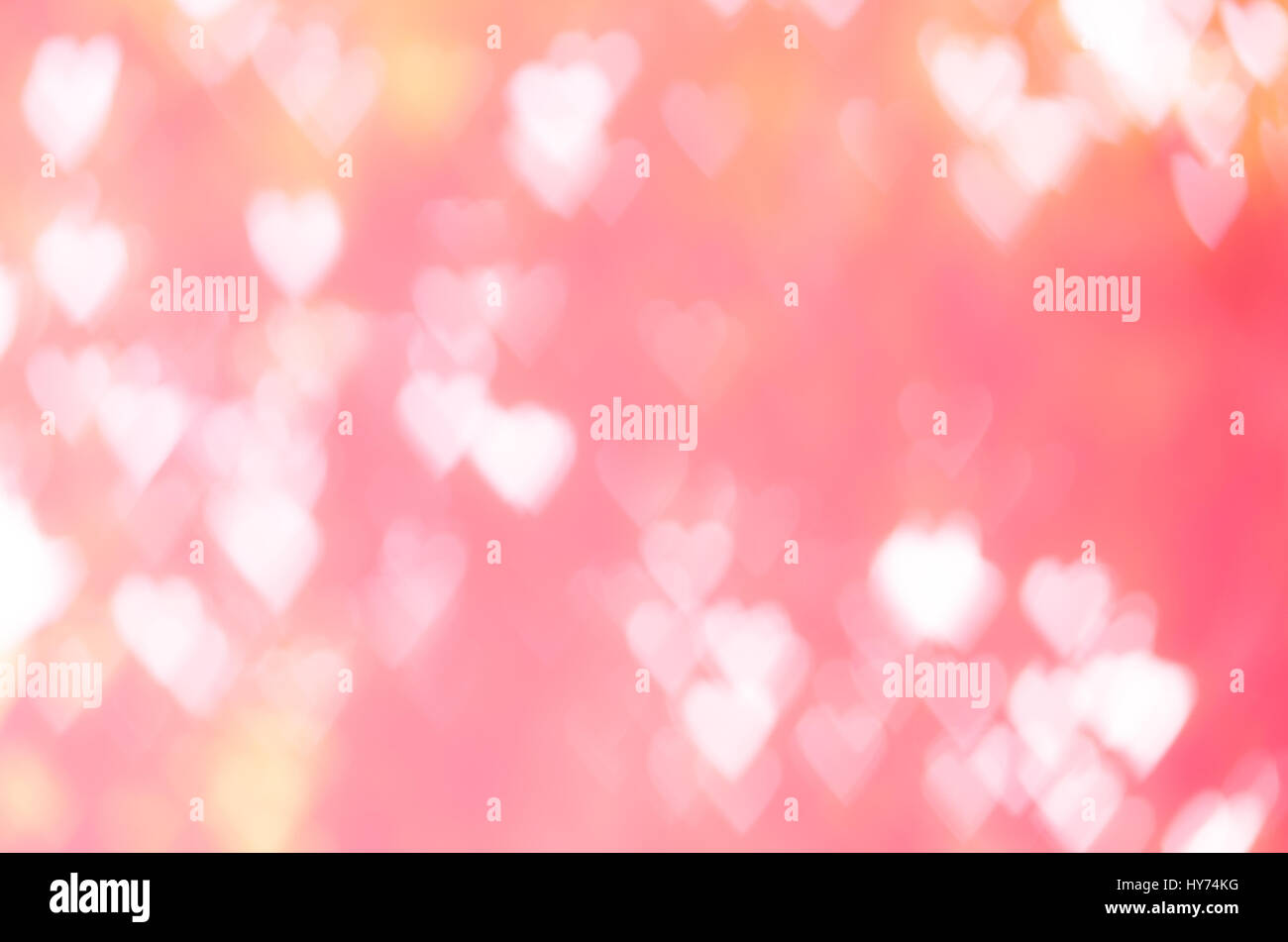 Abstract cuore di sfondo bokeh di fondo di forma in un tono caldo Foto Stock