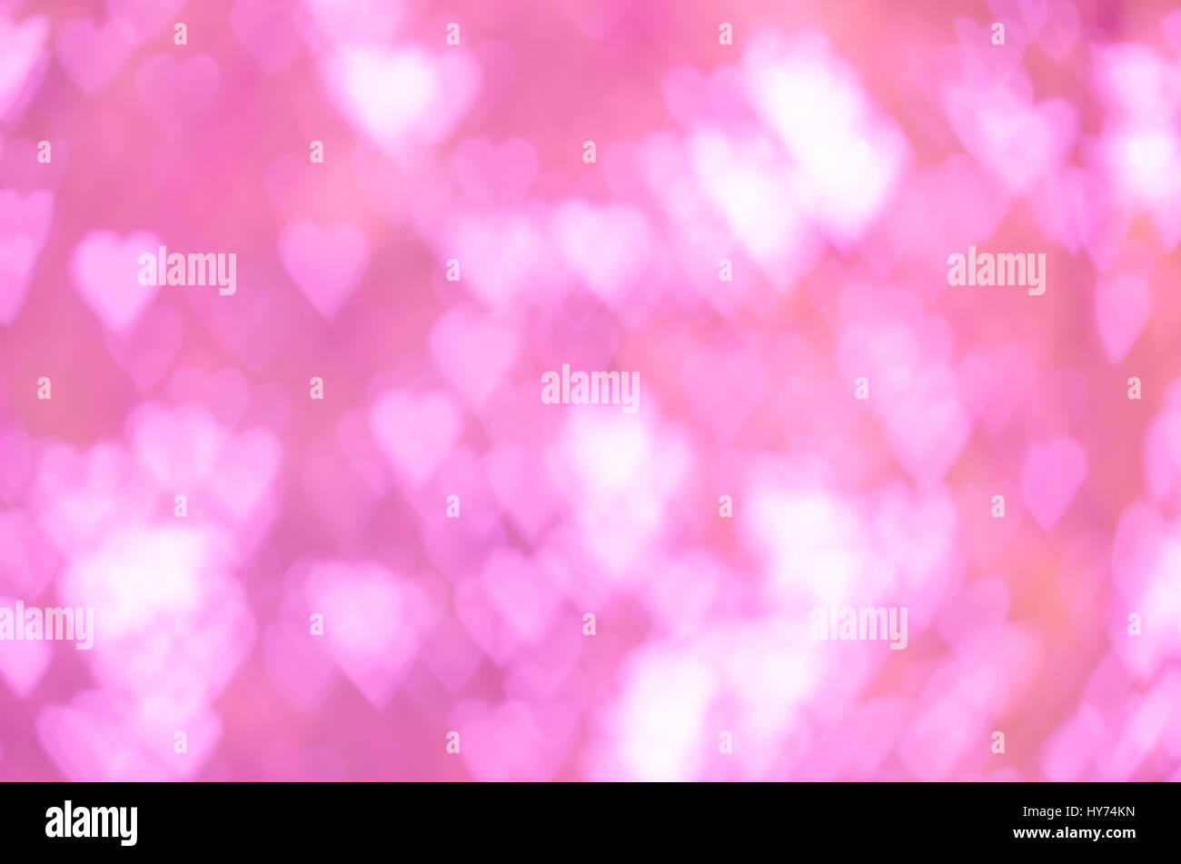 Abstract cuore di sfondo bokeh di fondo di forma in tonalità rosa Foto Stock