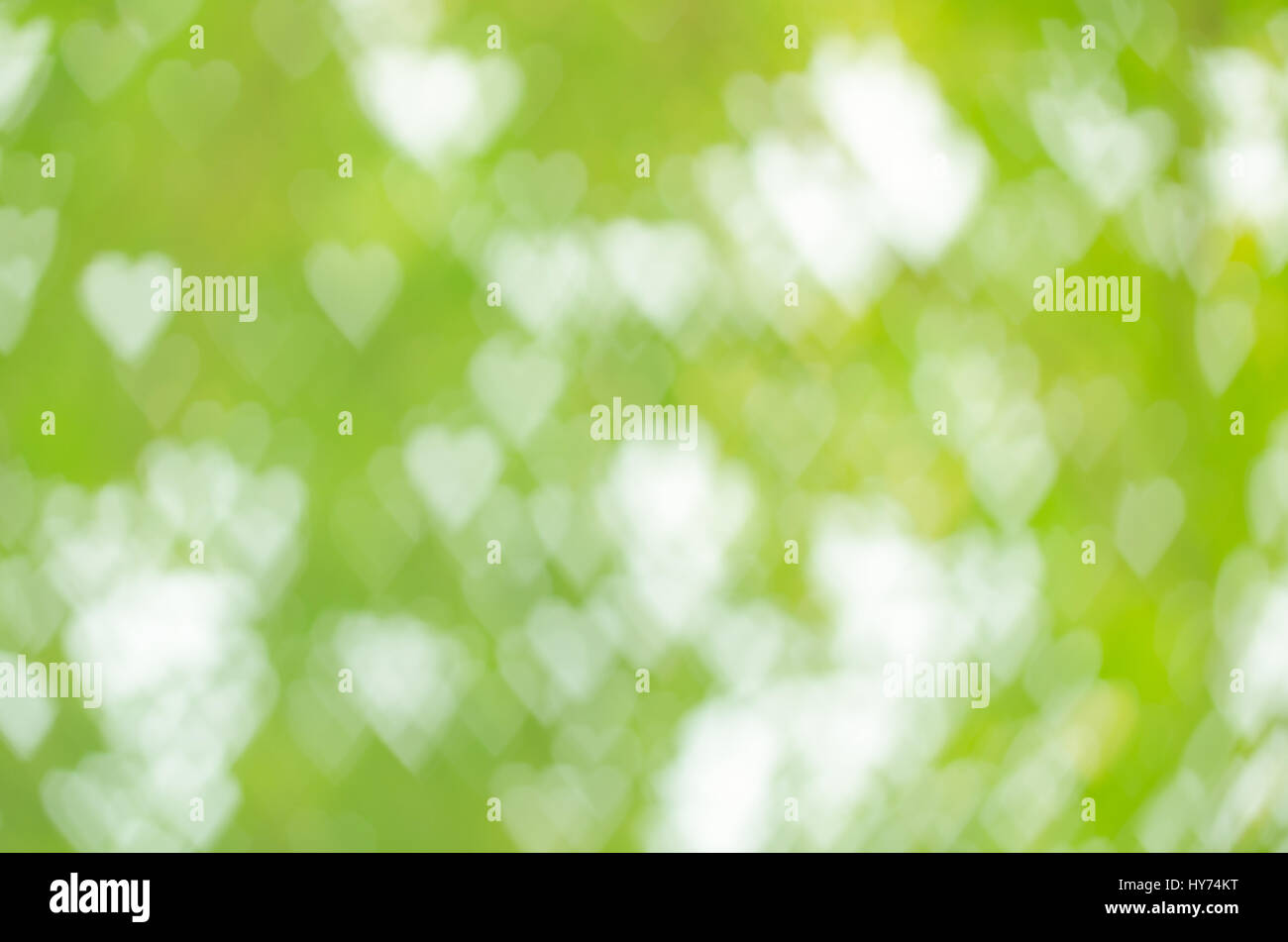 Abstract cuore di sfondo bokeh di fondo di forma in tono verde Foto Stock