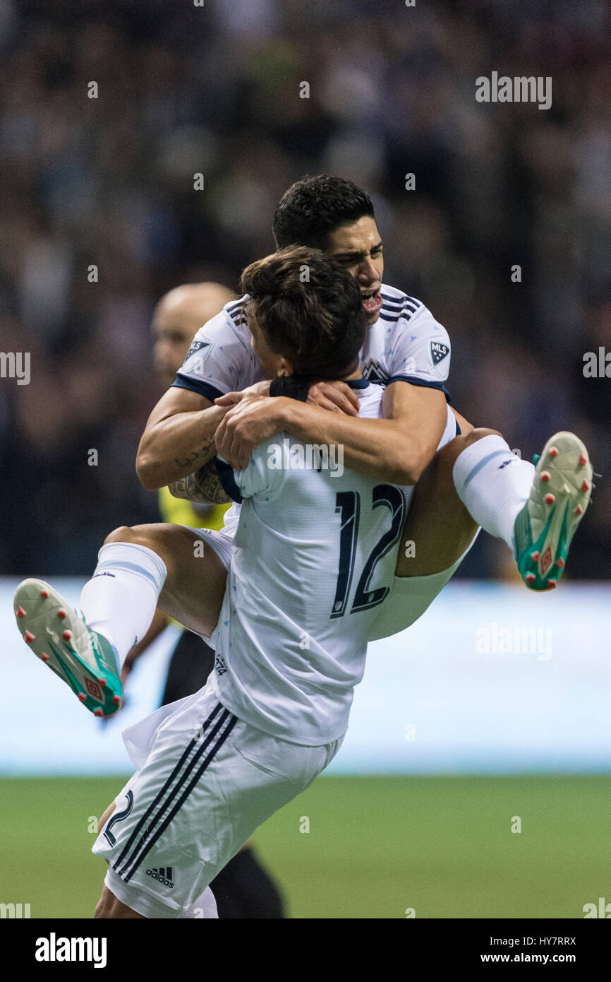 Vancouver, Canada. 1 Aprile, 2017. Matias Laba (15) di Vancouver Whitecaps, saltare su Fredy Montero (12) di Vancouver Whitecaps nella celebrazione di un obiettivo. Vancouver sconfigge Los Angeles 4-2, con obiettivi Whitecap da Cristian Techera (13), Fredy Montero (12) e 2 gol da Matias Laba (15), Vancouver Whitecaps vs galassia di Los Angeles, BC Place Stadium. . © Gerry Rousseau/Alamy Live News Foto Stock