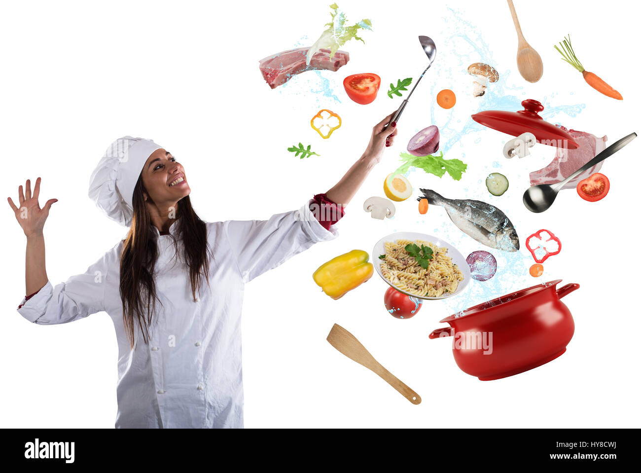 Lo chef cucinare con armonia Foto Stock