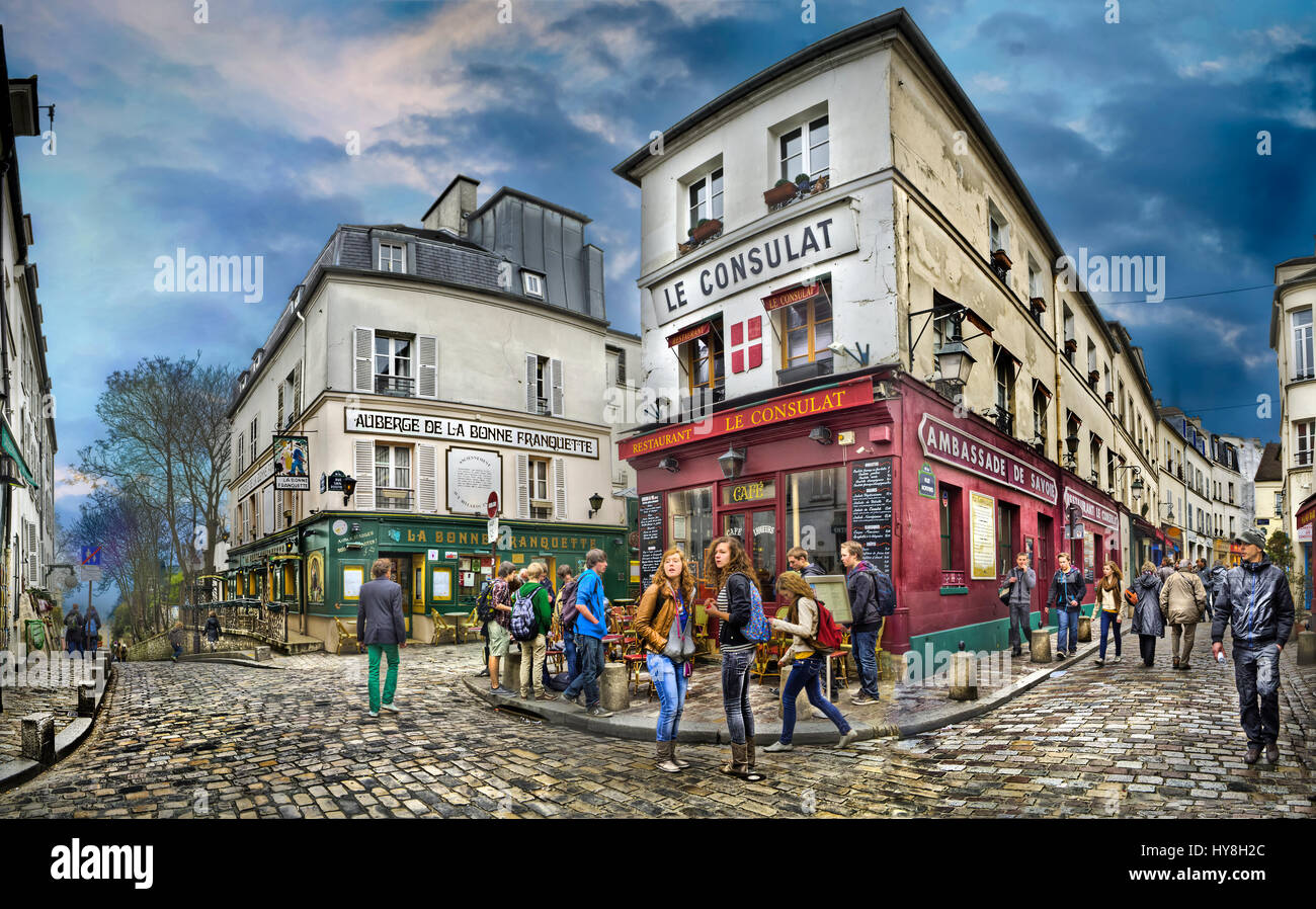 Turisti che si siedono al Le consulat cafe Rue Norvins quartiere di Montmartre Parigi Francia EU Europe Foto Stock