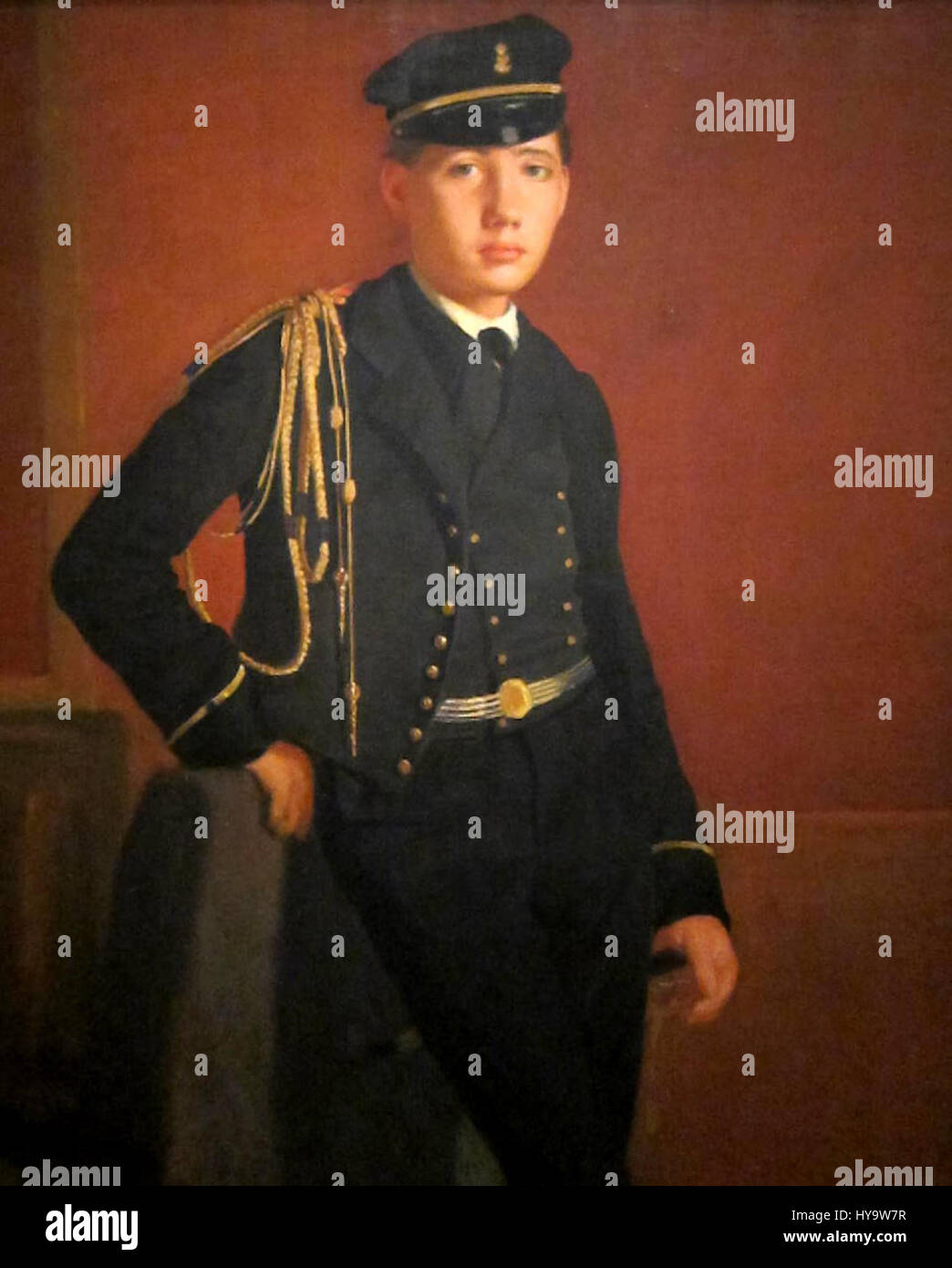 Questo ritratto di Achille De gas ritrae un giovane cadetto in uniforme militare, che riflette la moda e la cultura militare del XIX secolo. L'abbigliamento formale del soggetto mette in evidenza il rispetto per la disciplina e il dovere durante il tempo. Foto Stock