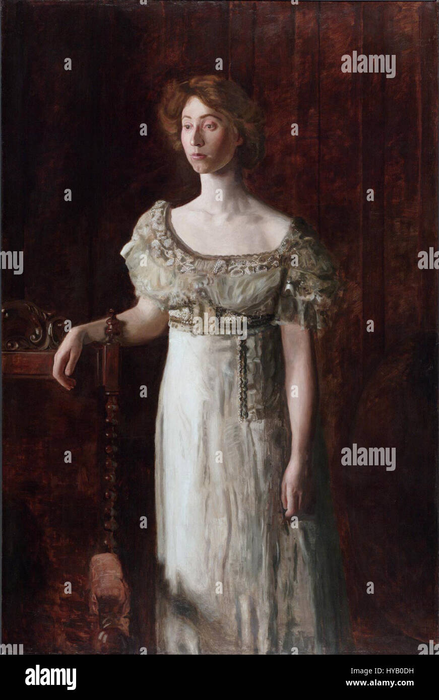 Il ritratto di Thomas Eakins della signorina Helen Parker, dipinto nel 1908, è un esempio sorprendente del suo approccio realistico alla ritrattistica. Il dipinto cattura Parker in una posa serena e contemplativa, riflettendo l'abilità di Eakins nel rappresentare la forma umana con precisione anatomica e profondità emotiva. Anche la sua padronanza della luce e dell'ombra è evidente. Foto Stock