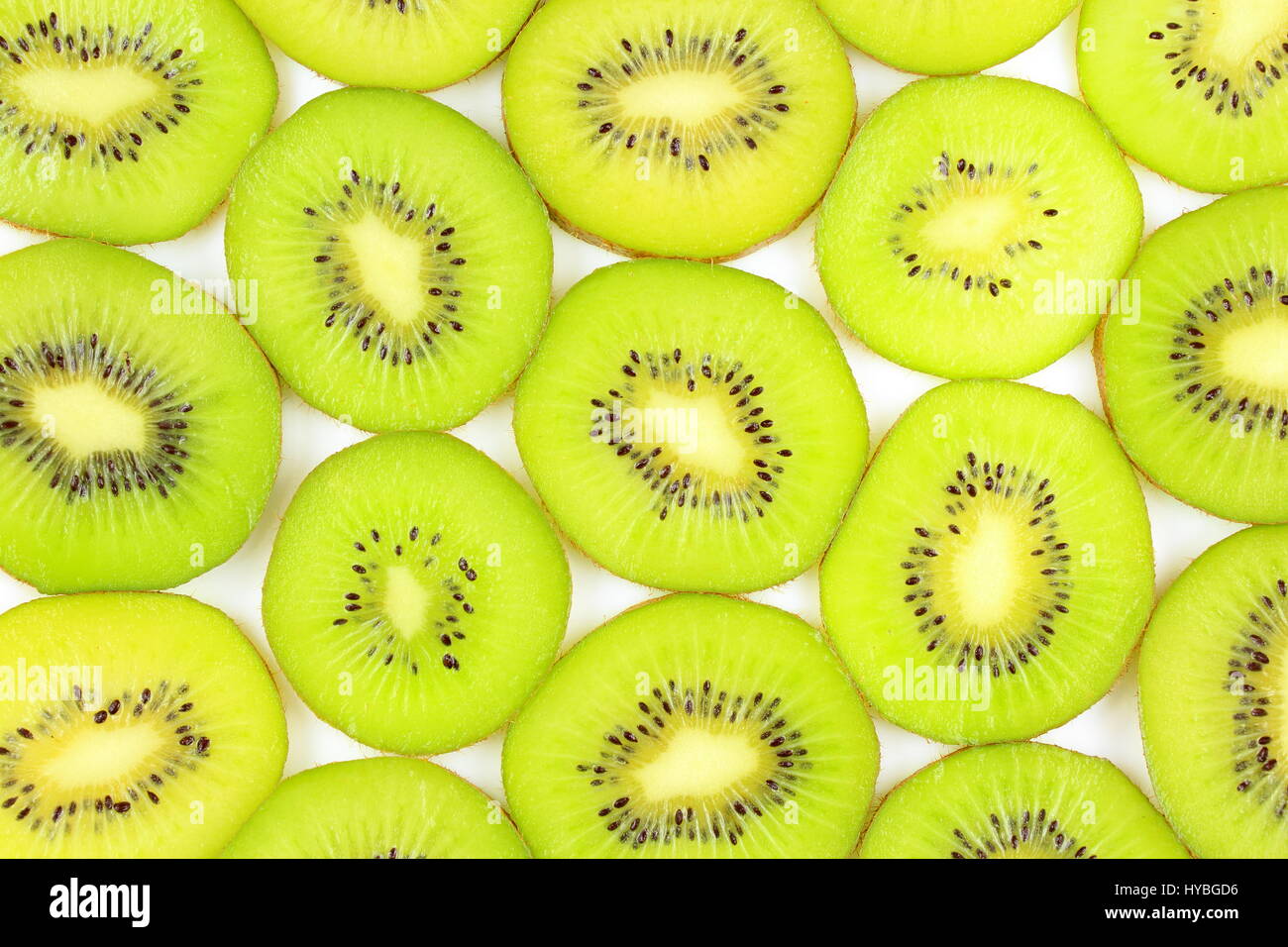 Fette di fresco verde kiwi come un cibo texture di sfondo Foto Stock