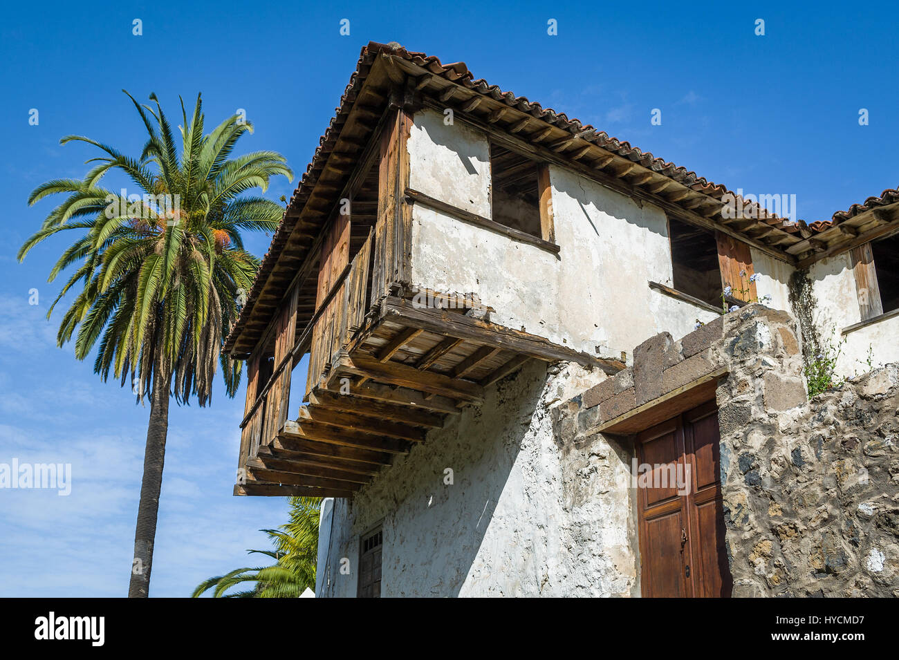 Vecchia casa a Icod de los Vinos e Palm tree. Isola di Tenerife, Spagna. Foto Stock