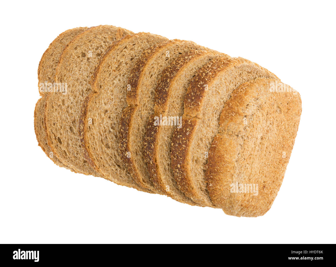 Vista superiore di diverse fette di tutte in pietra naturale tutta la massa di pane di grano isolato su uno sfondo bianco. Foto Stock