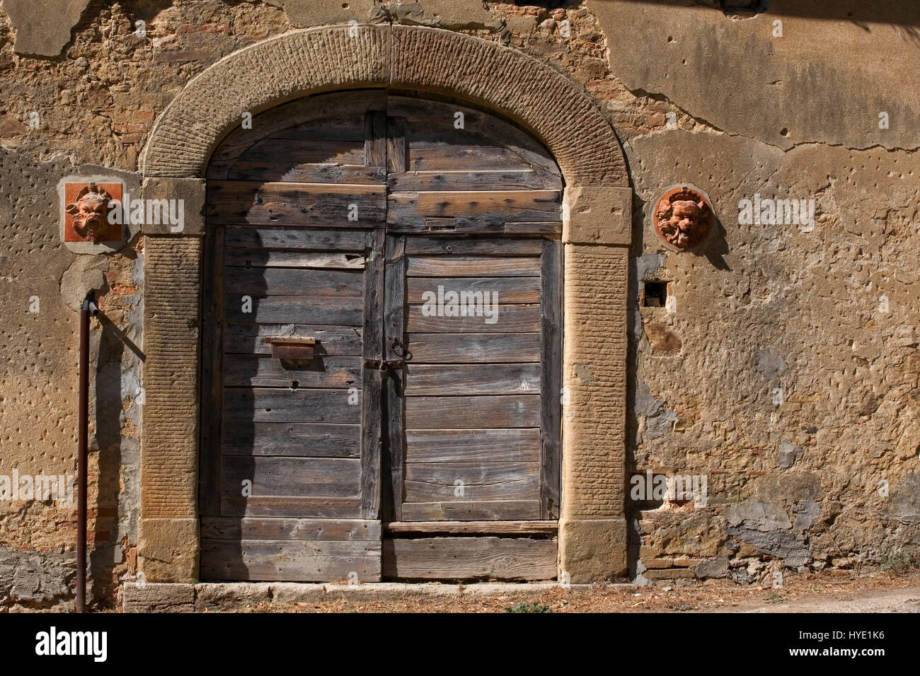 Antica porta, Luco, Siena, Toscana, Italia Foto Stock
