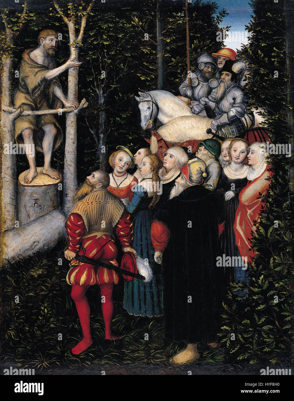Lucas Cranach il Vecchio, un pittore rinascimentale tedesco, è noto per i suoi soggetti religiosi e mitologici. "Il sermone di San Giovanni Battista" è un esempio della sua attenzione ai temi biblici e ai dettagli meticolosi nel ritrarre figure e paesaggi. Foto Stock