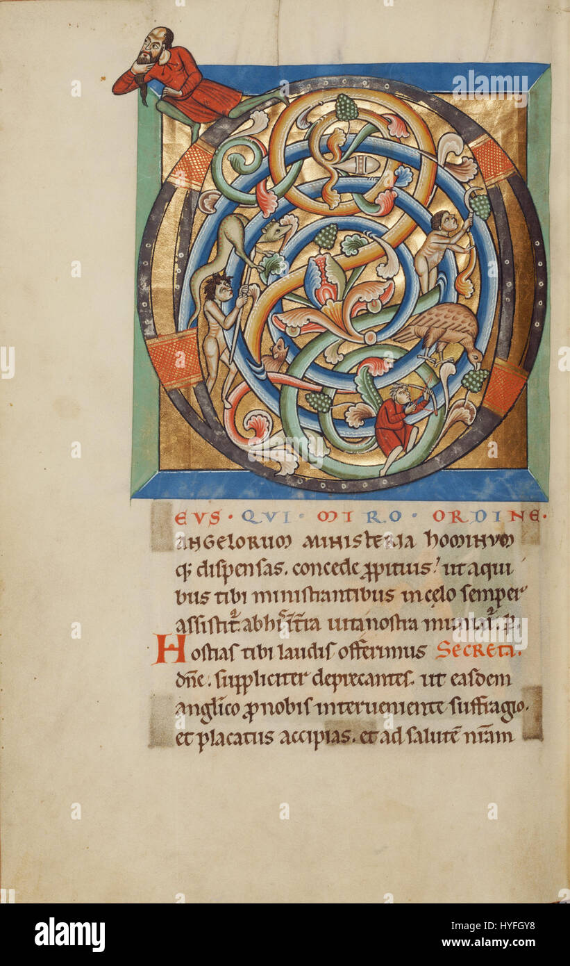 La "D iniziale abitata" presenta una lettera manoscritta decorativa "D" con figure e ornamenti elaborati all'interno della lettera. Questa forma di manoscritti miniati era comune durante il periodo medievale, mostrando disegni e calligrafie intricate. Foto Stock