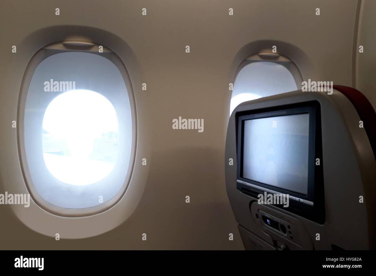 Aeroplano sedi nella finestra Visualizza Foto Stock