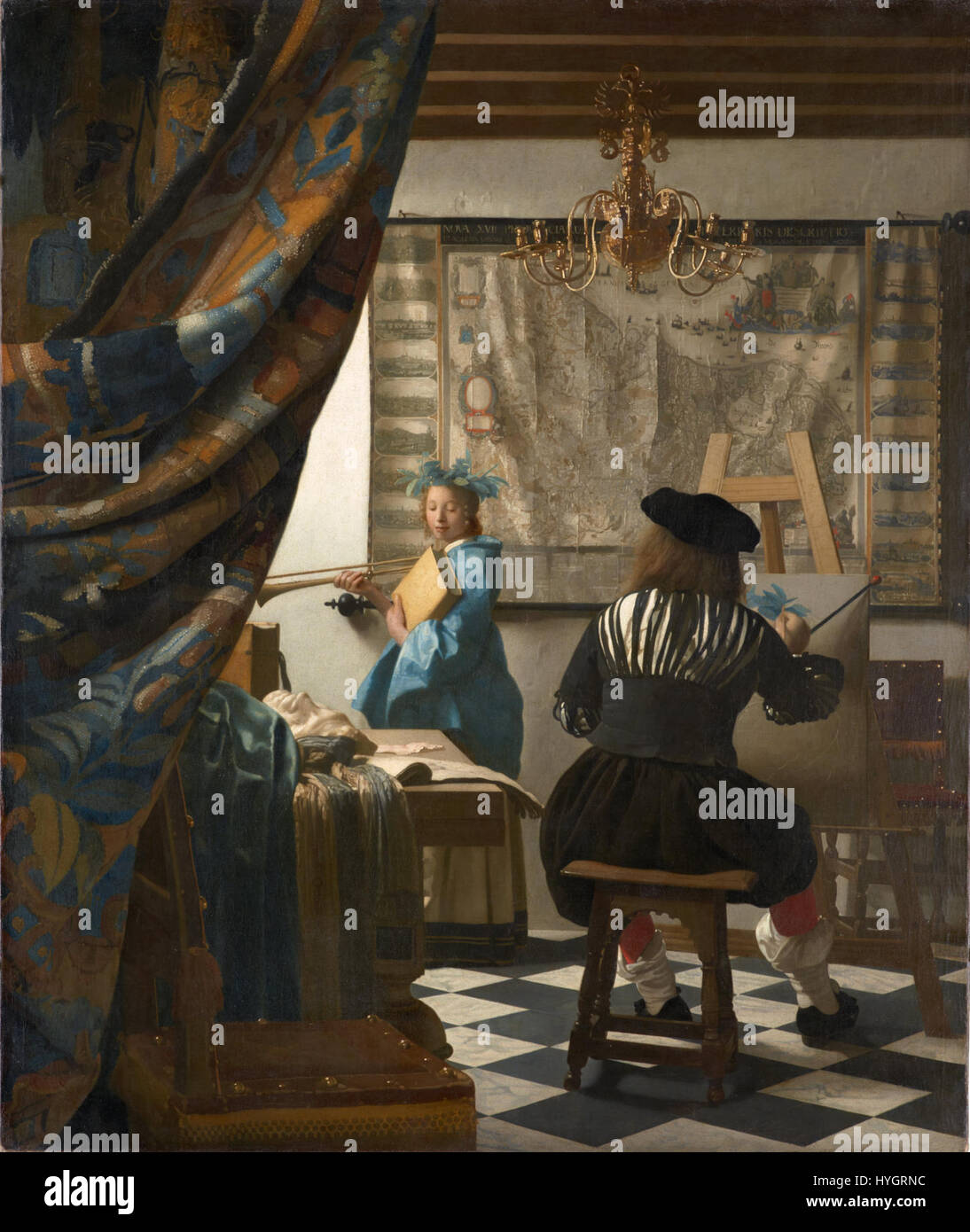 In "l'arte della pittura", Jan Vermeer cattura l'intricato processo di pittura, presentando un artista al lavoro. Conosciuto per la sua padronanza della luce e dei colori, Vermeer illustra l'atto stesso della creazione in questo famoso pezzo. Foto Stock