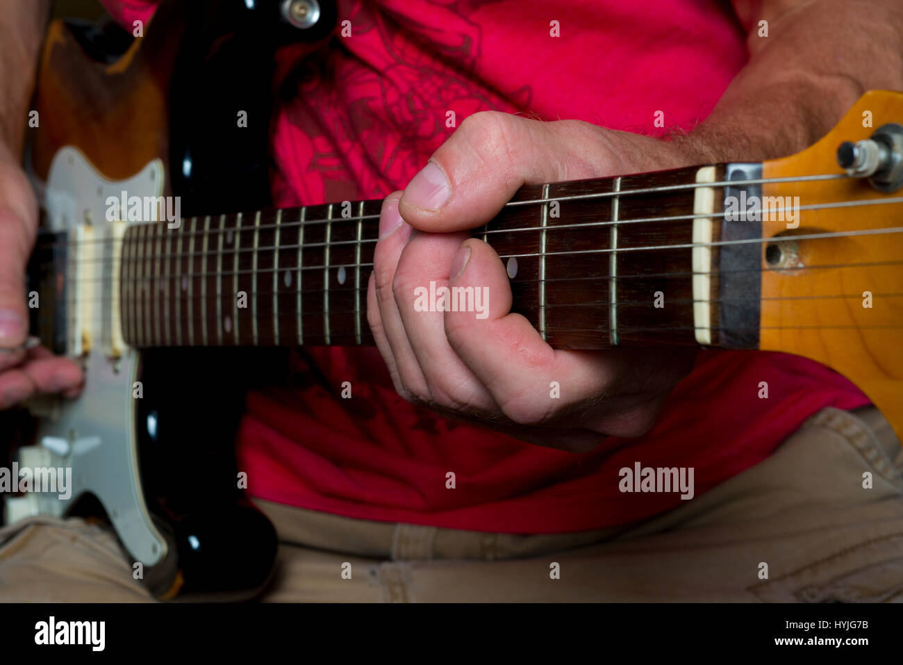 Riproduzione di six string giallo chitarra elettrica Foto Stock