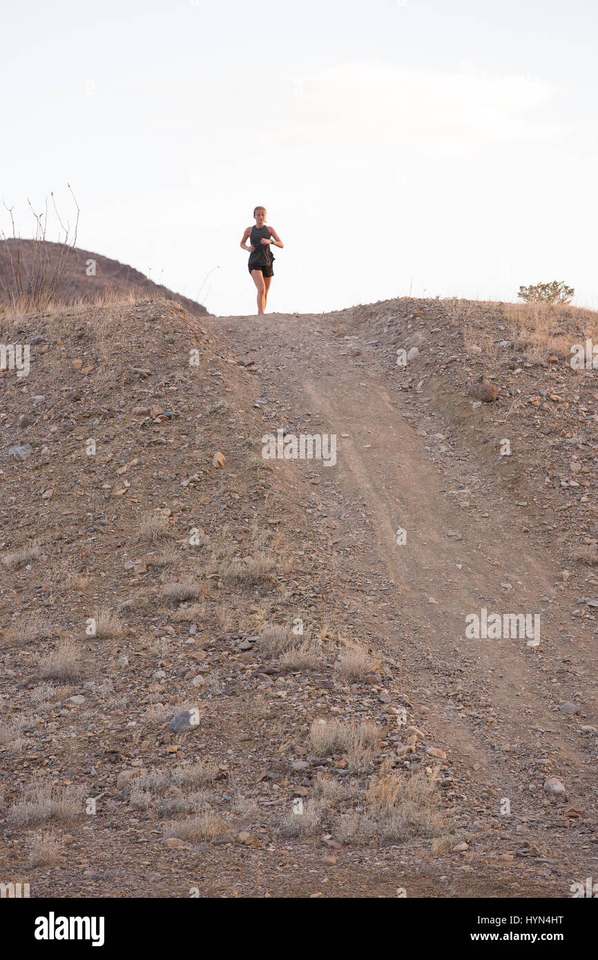 Femmina Topping Runner Hill Foto Stock