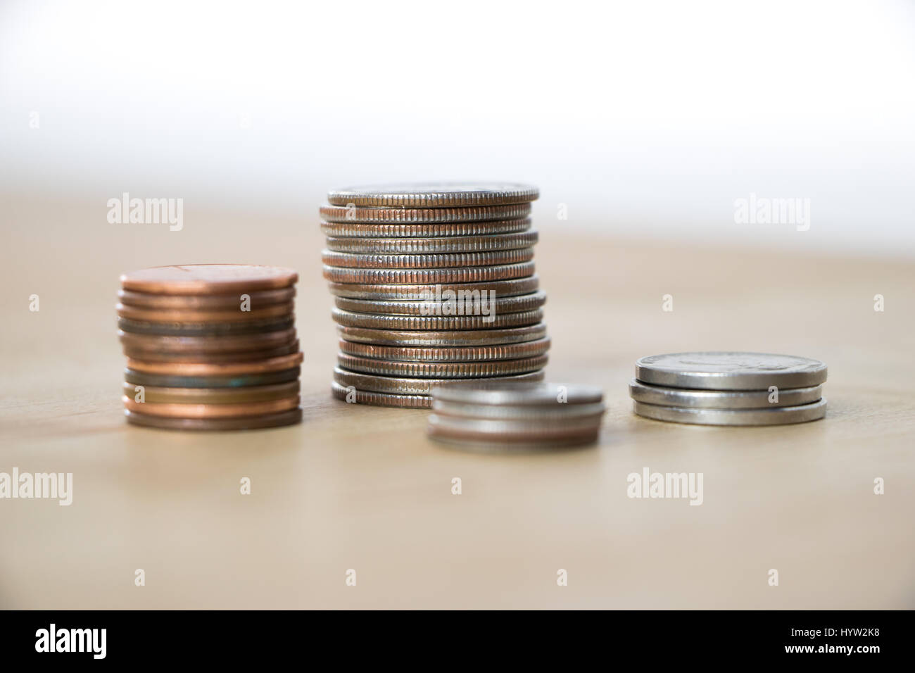 Pile di monete americano Foto Stock