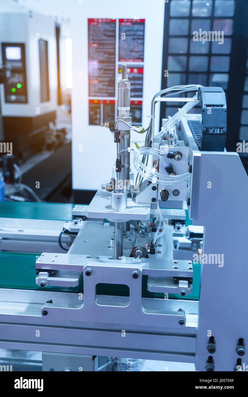 Macchina industriale e la fabbrica del braccio di robot,smart factory industry 4.0 concetto. Foto Stock