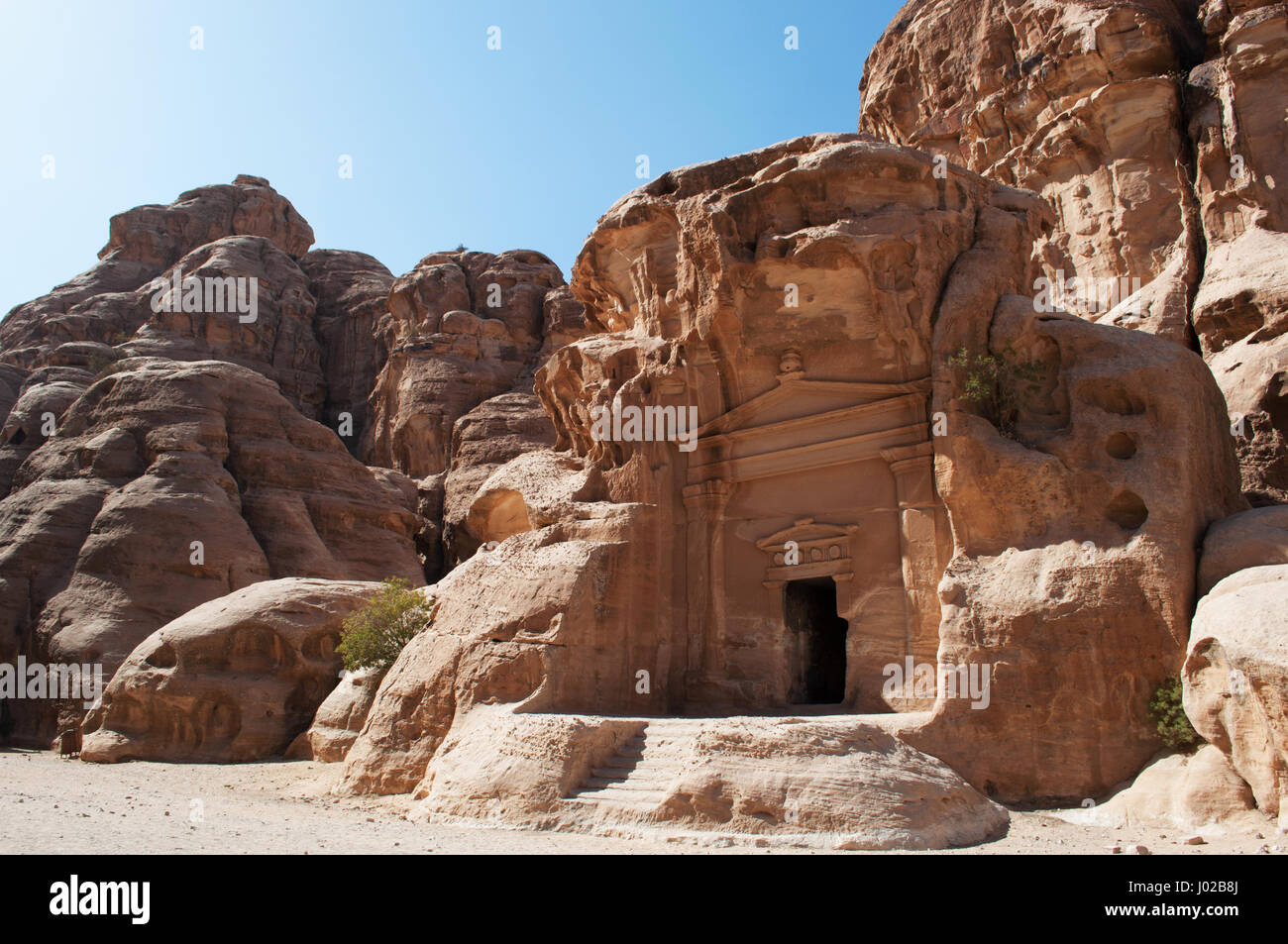 Beidah: vista di Little Petra, noto come Siq al-Barid, Nabataean un sito archeologico con edifici scolpite nelle pareti del canyon di arenaria Foto Stock