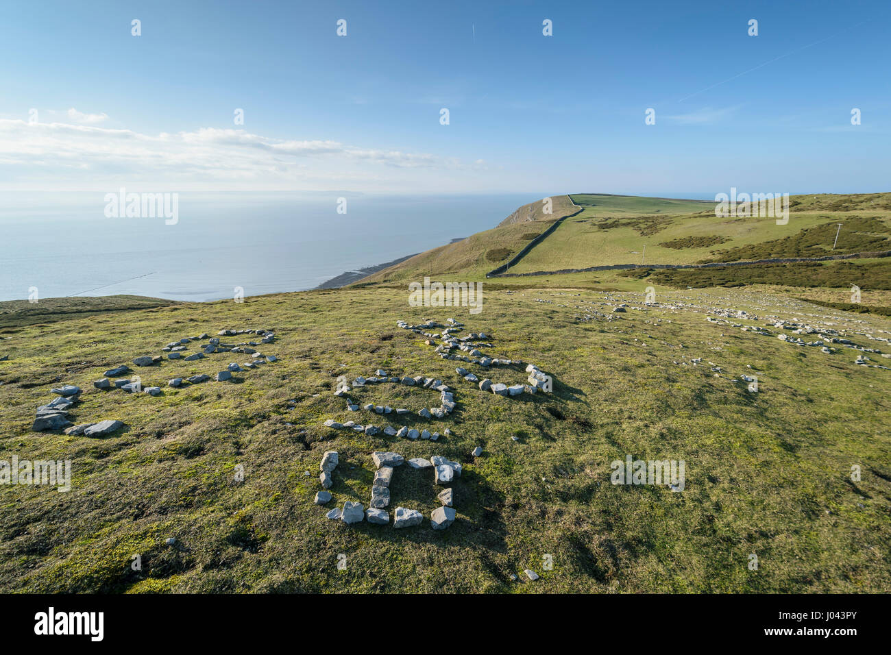 Messaggi di pietra sulla collina di grande Ormes vertice di testa in Llandudno North Wales UK Foto Stock