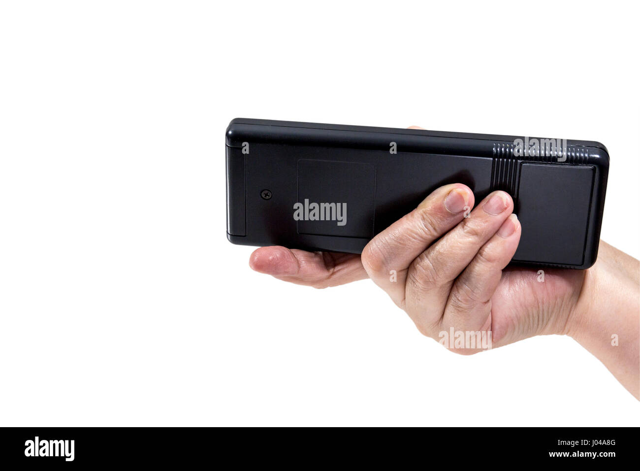 Controller nero dal TV nelle mani di una donna Foto Stock