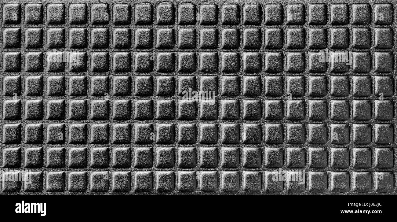 Shiny Black background, sintetico materiale schiumoso con righe parallele. Foto Stock
